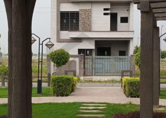 Hot location 5 marla triple story facing park modern design grey structure house for sale in Central Park E block